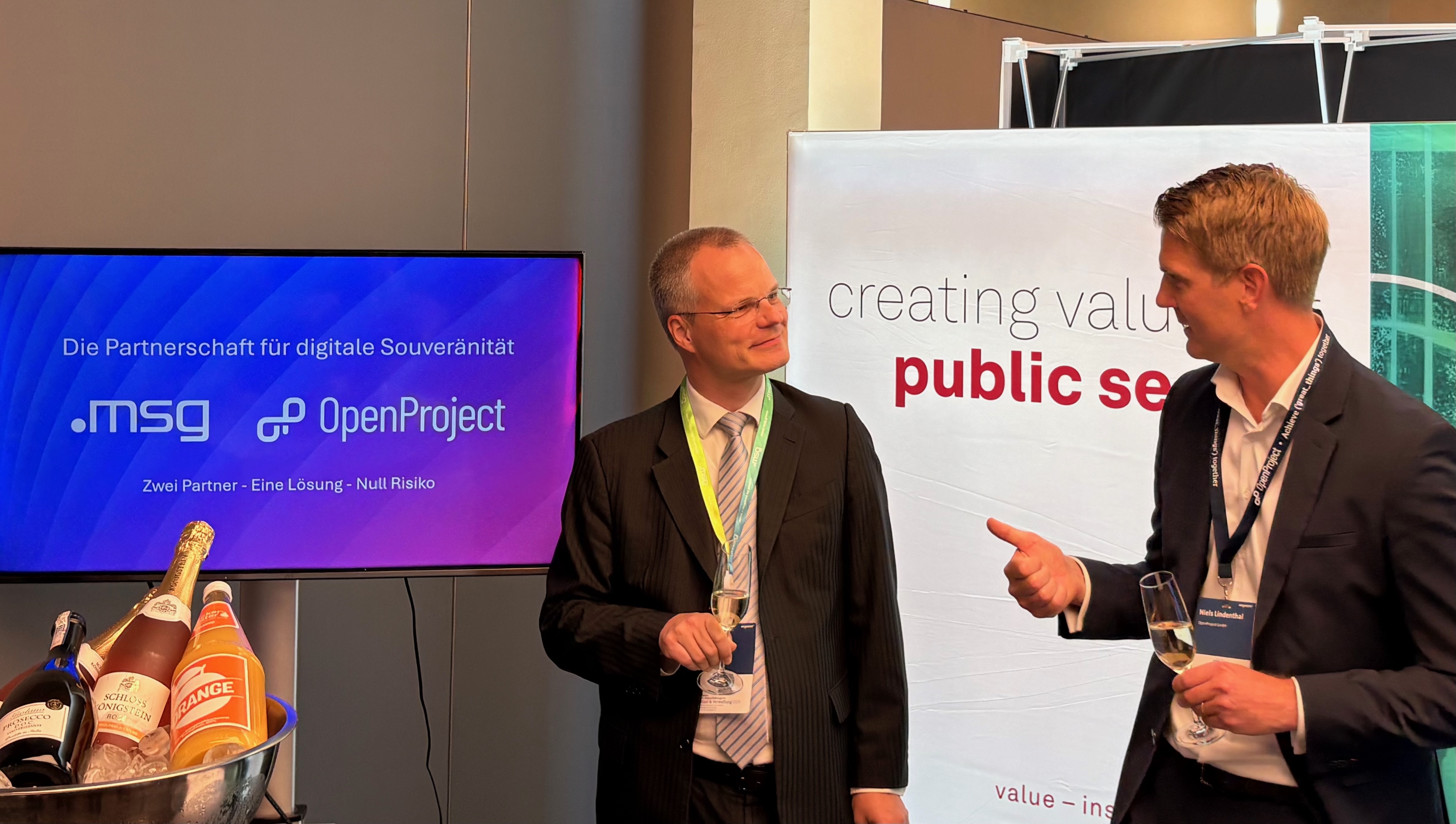 Frank Schlottmann (msg) and Niels Lindenthal (OpenProject) announcing the partnership between msg and OpenProject at the Zukunftskongress Staat & Verwaltung 2026 in Berlin.